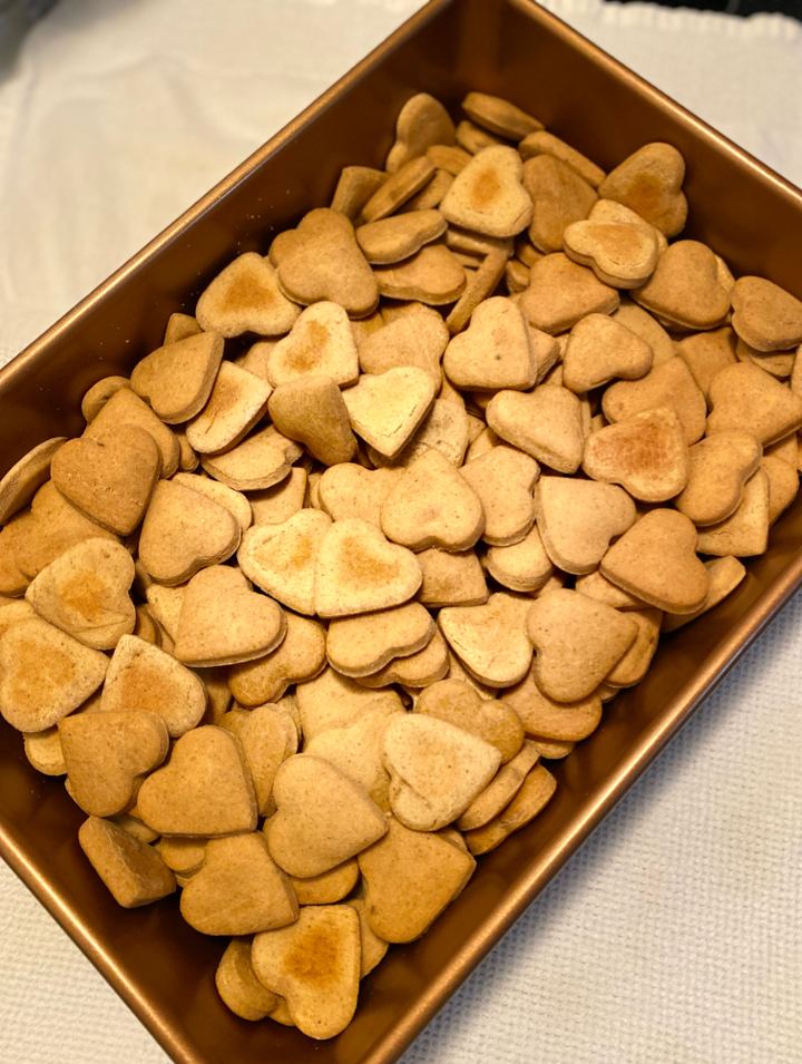 Tray of heart-shaped gluten-free dog treats